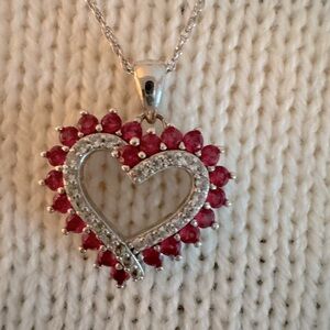 Beautiful heart necklace with lab created rubies and white sapphires